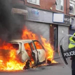 Car-burns-in-uk-protest-naq-news-politics