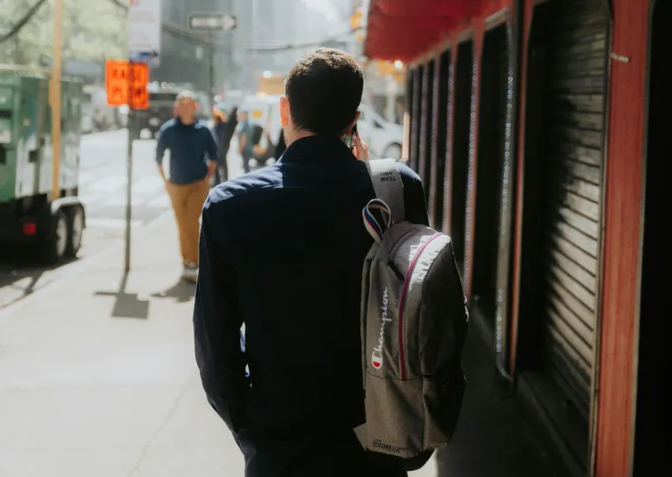 Guy walking in NYC